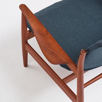 Finn Juhl, a pair of "FD 136" easy chairs, France & Daverkosen, Denmark, 1950s.