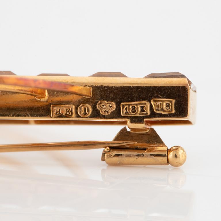 Brooch, Stigbert, Engelbert, 18K gold with synthetic white stones.