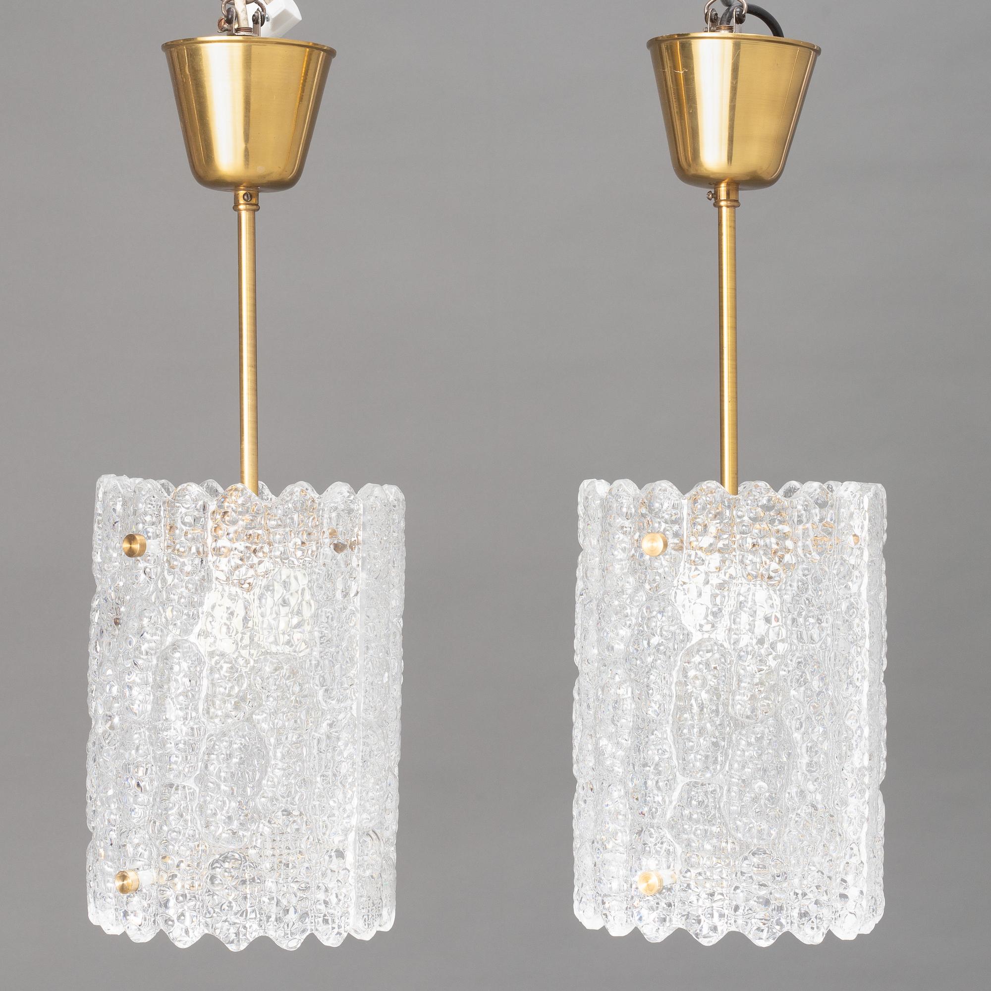 Carl Fagerlund, a pair of ceiling lamps, Orrefors, second half of the 20th Century.