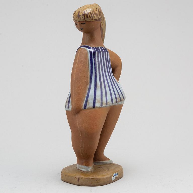 LISA LARSON, a 'Dora' stoneware figurine, from ABC-Flickorna, Gustavsberg.