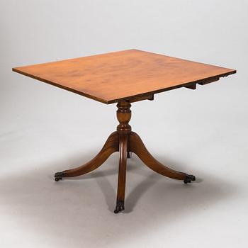 A 20th century English style dining table.