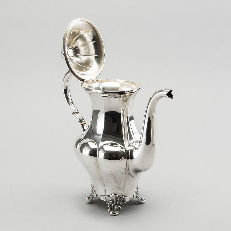 A three piece silver coffee service byGAB AB 1932-33, 1330g.