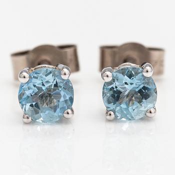 A pair of 18K white gold and aquamarine earrings.