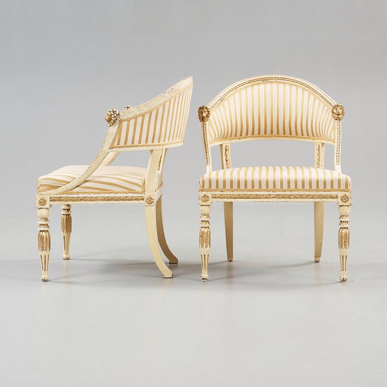 A pair of late Gustavian early 19th century armchairs.