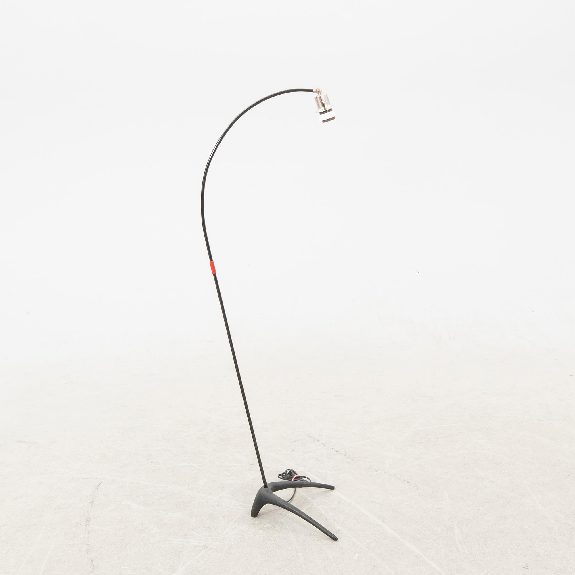 A metal floor lamp from the later part of the 20th century.
