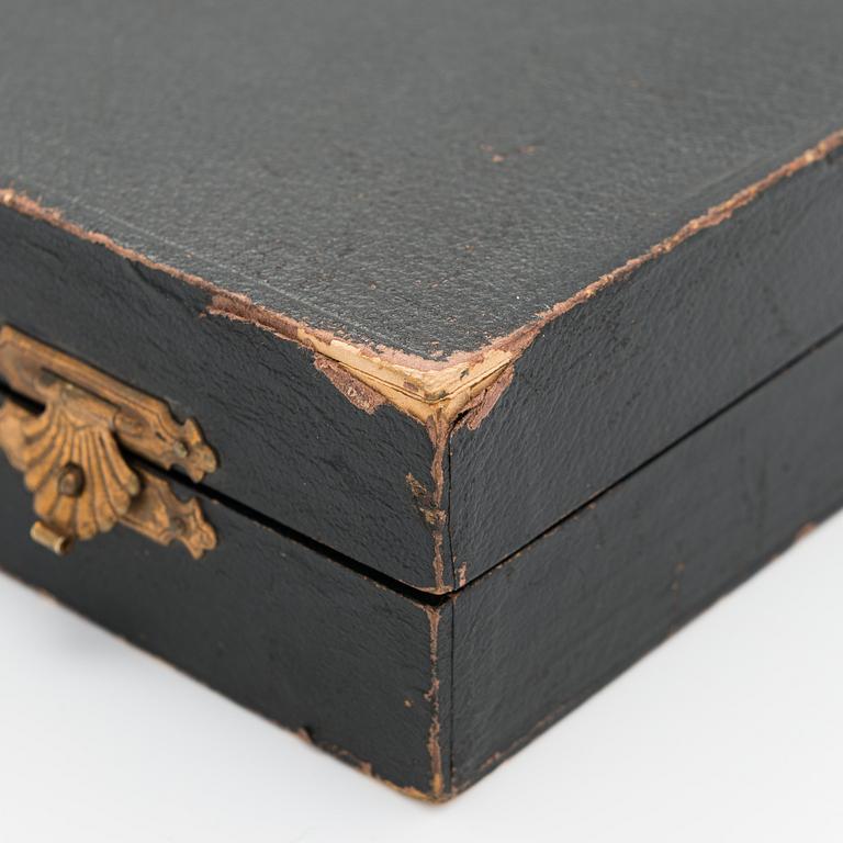 An Omega Calculating Machine" from early 1900s.