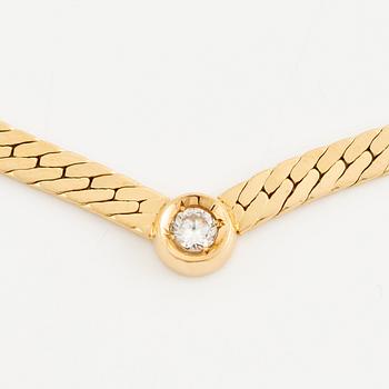 Necklace 18K gold with a round brilliant-cut diamond.