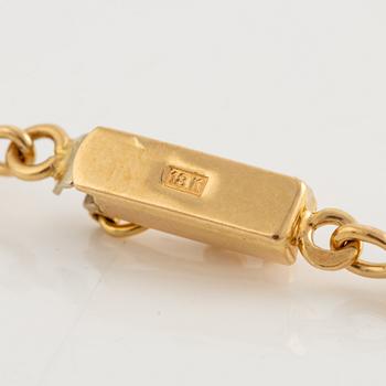 Necklace 18K gold with a round brilliant-cut diamond.