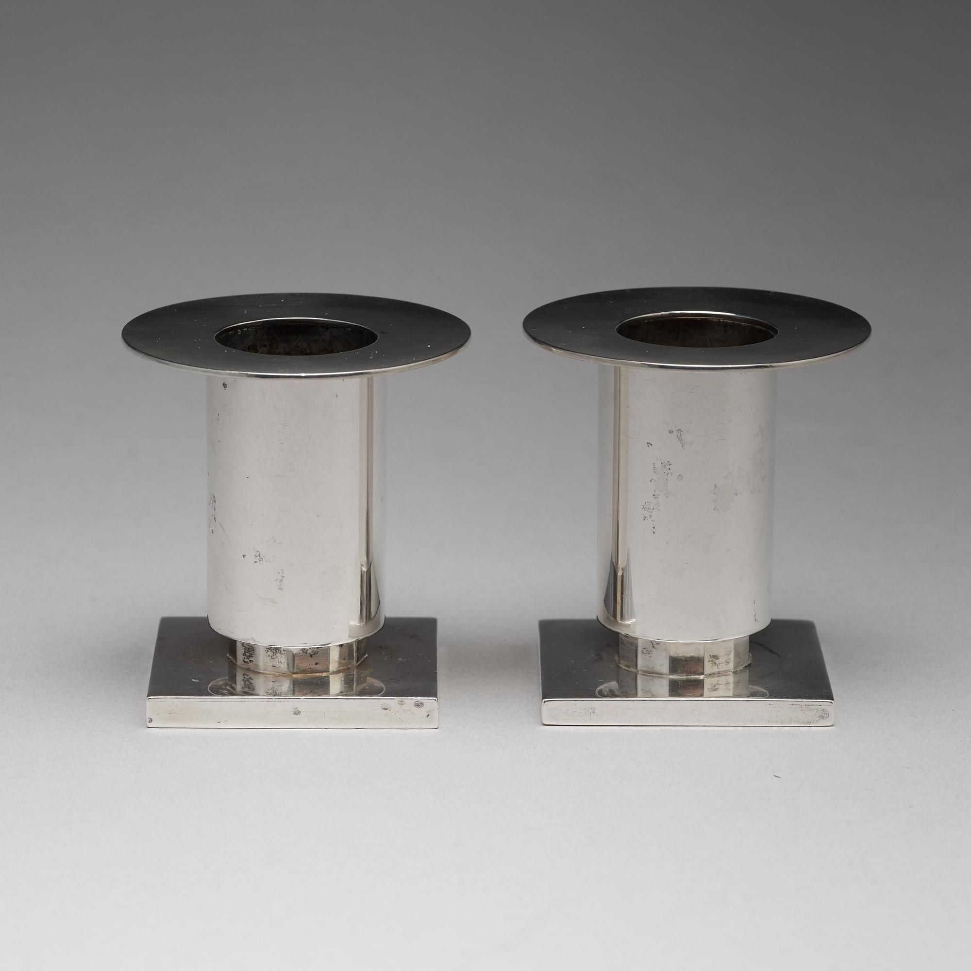 Wiwen Nilsson, a silver set with a pair of candlesticks and a cigarette case, Lund Sweden 1927-38.
