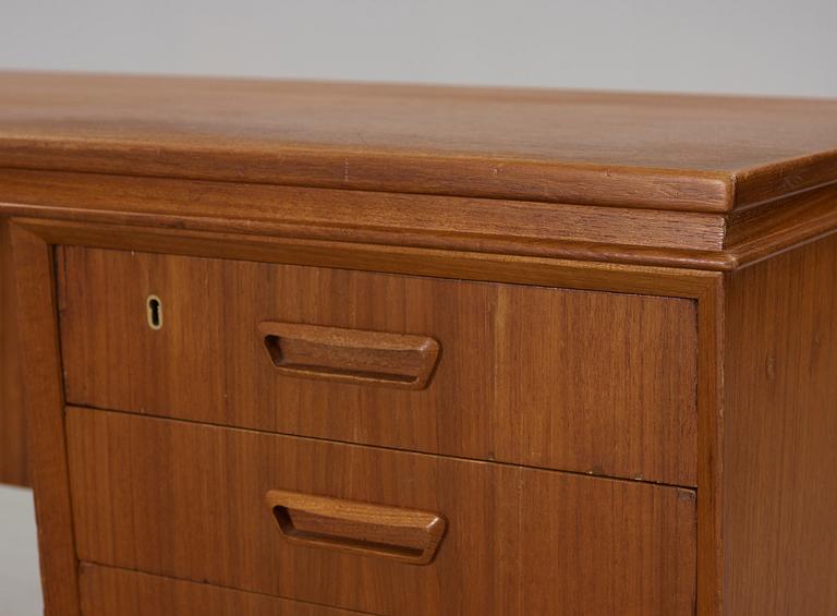 A second half of the 20th century teak desk.