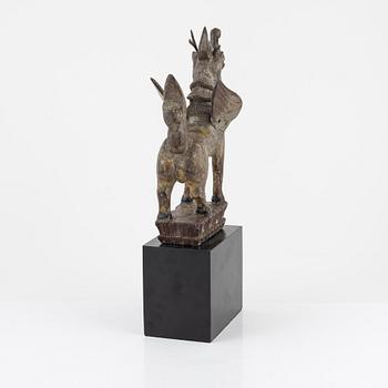 A wooden sculpture of a mythical best, Thailand, 20th Century.