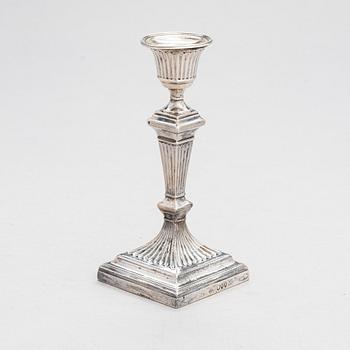 A late 19th-century sterling silver candlestick, maker's mark of William Hutton & Sons, London 1893.