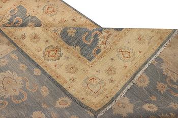 An Ushak rug, c. 242 x 165 cm.