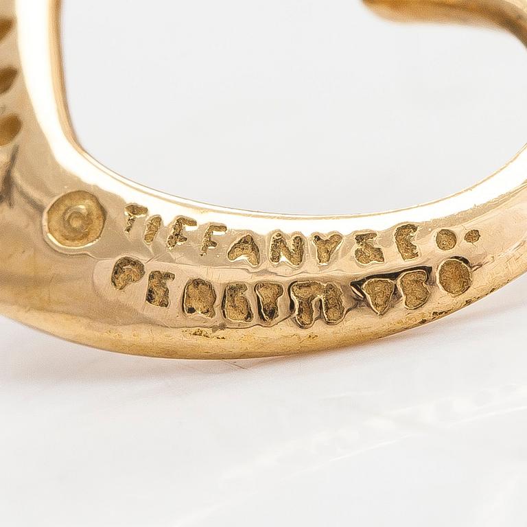 Tiffany & Co, Elsa Peretti, an 18K gold 'Open Heart' necklace with small diamonds.