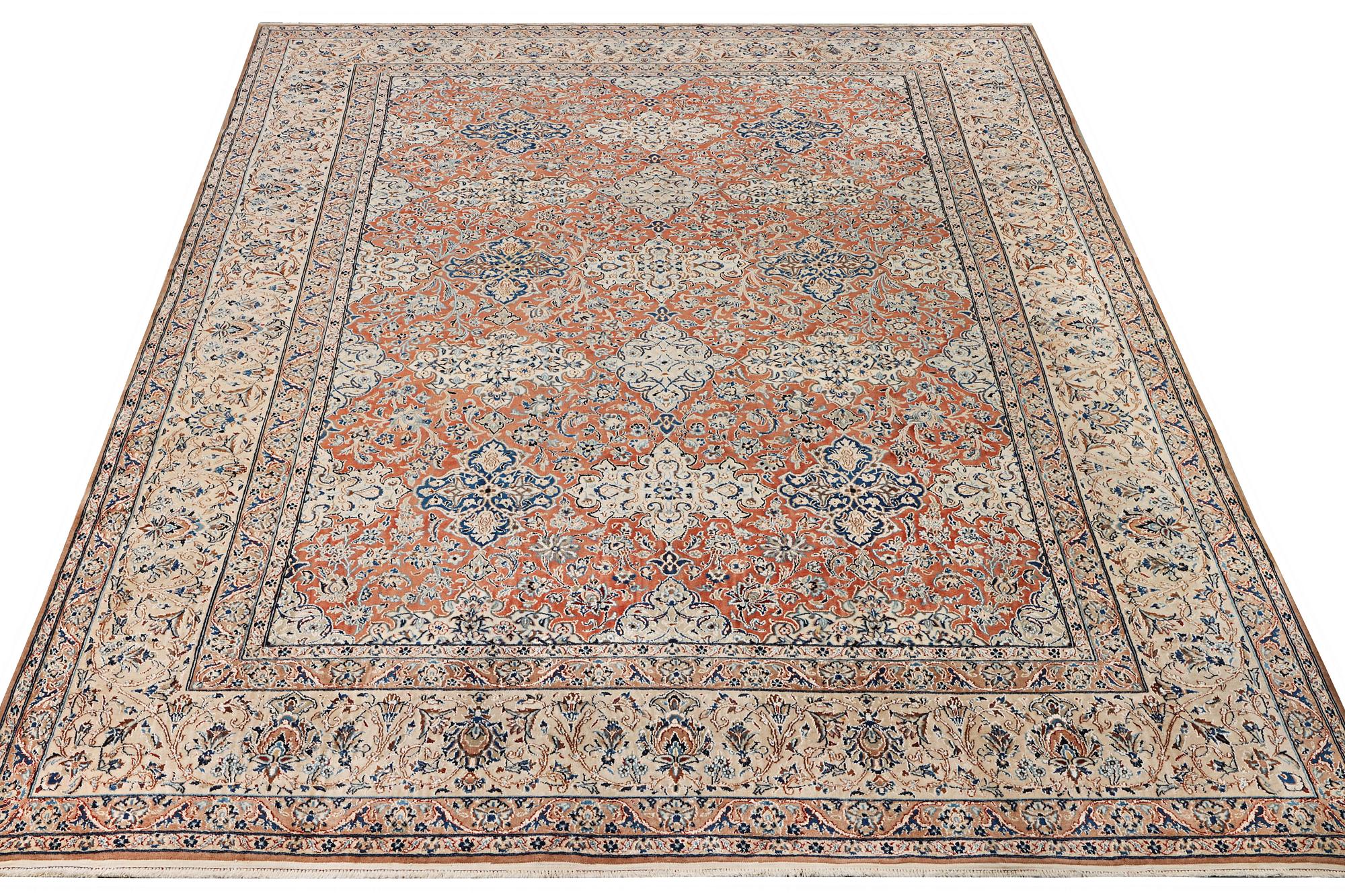 A semi-antique/old Nain carpet, part silk, c. 343 x 230 cm.