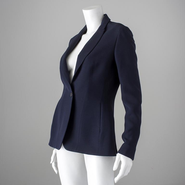 A darkblue jacket by Christian Dior.