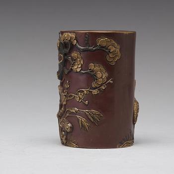 A bronze brush pot, Qing dynasty, with Qianlong seal mark to base.