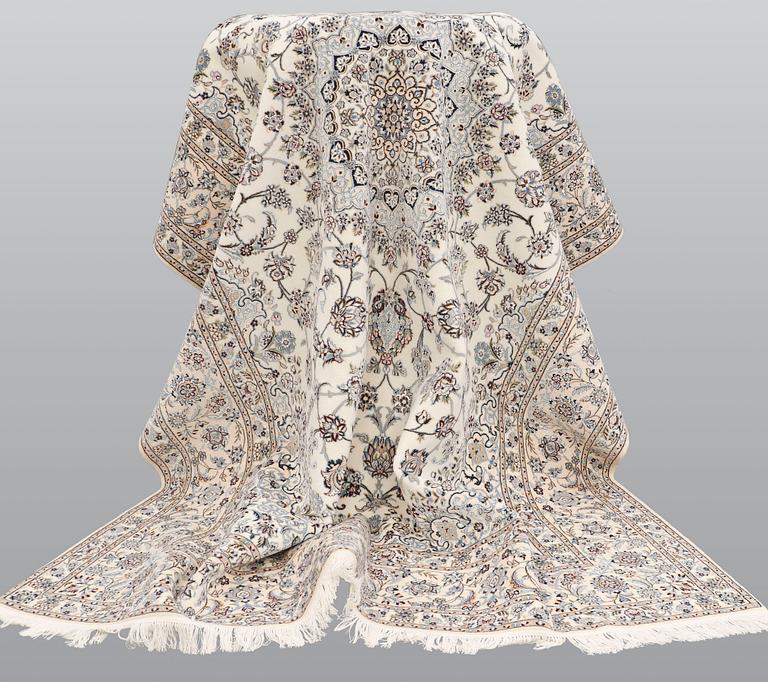 A carpet, Nain part silk s.k 6LAA, ca 310 X 209 cm.