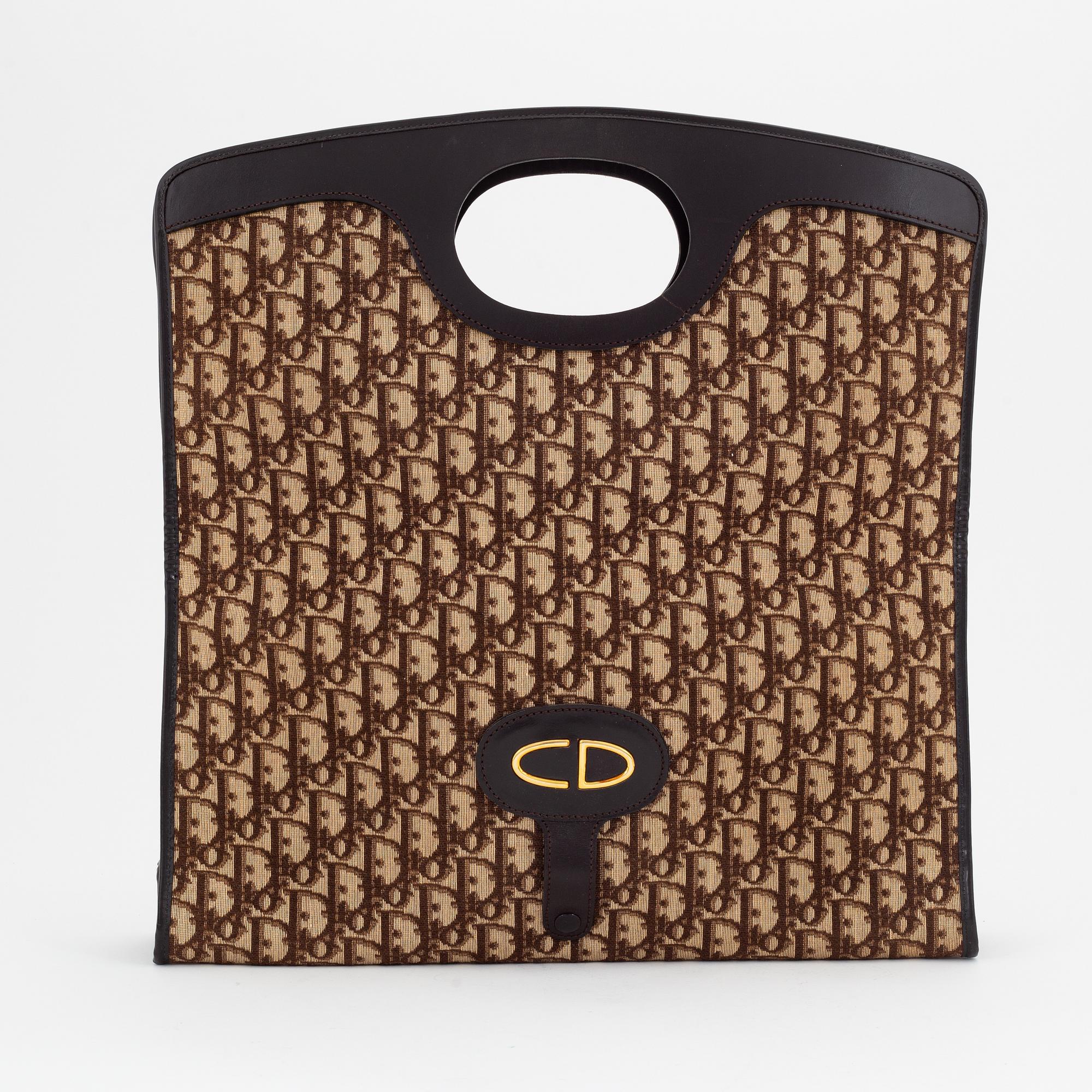 Christian Dior, a canvas tote bag.