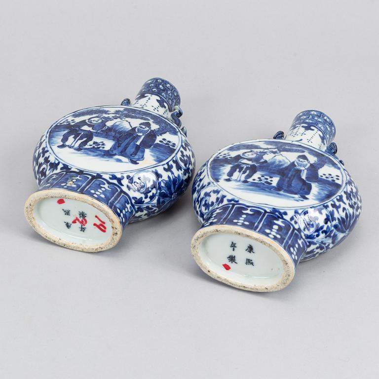 A pair of blue and white moon flasks, Qing dynasty, 19th Century.