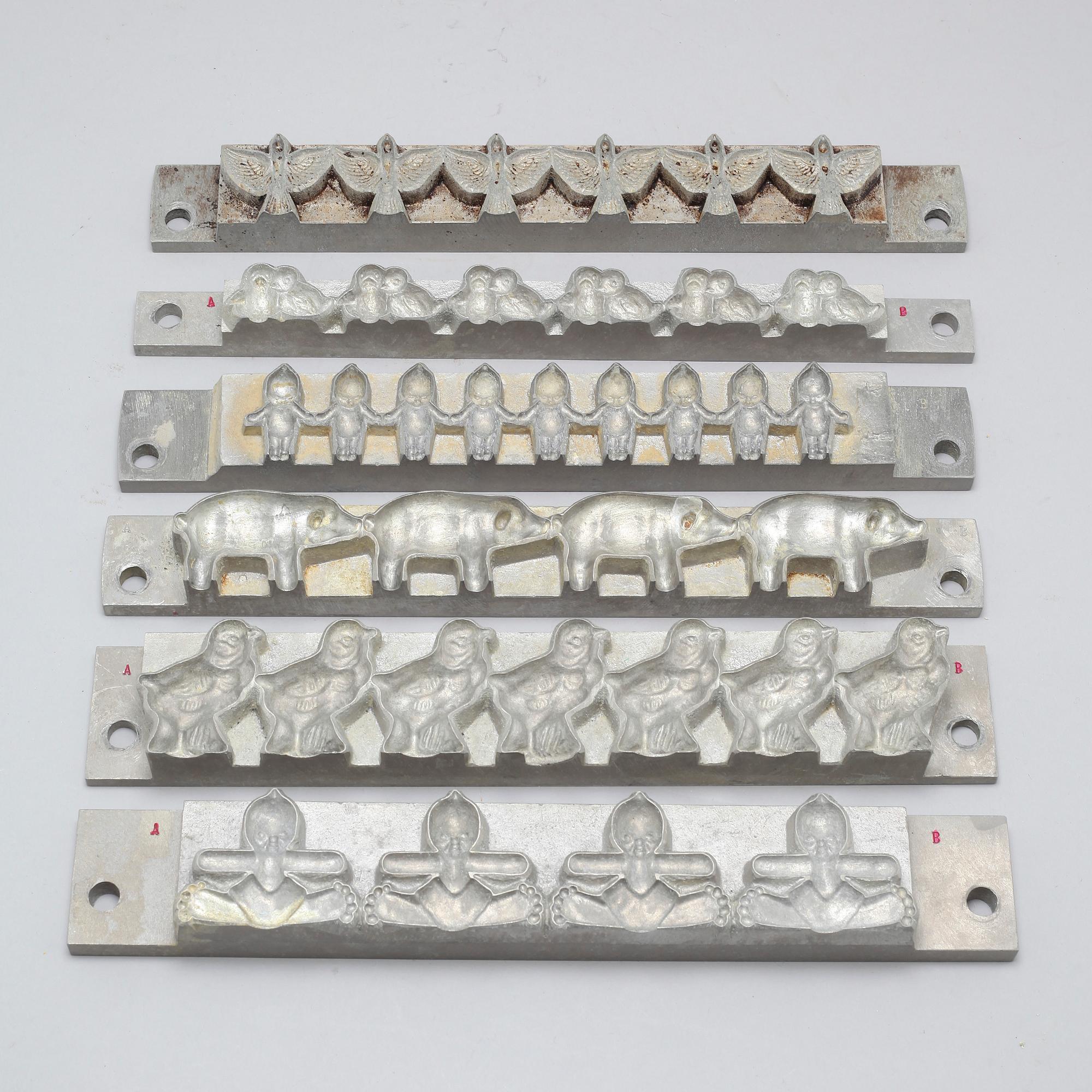 14 mid 20th century marzipan molds.