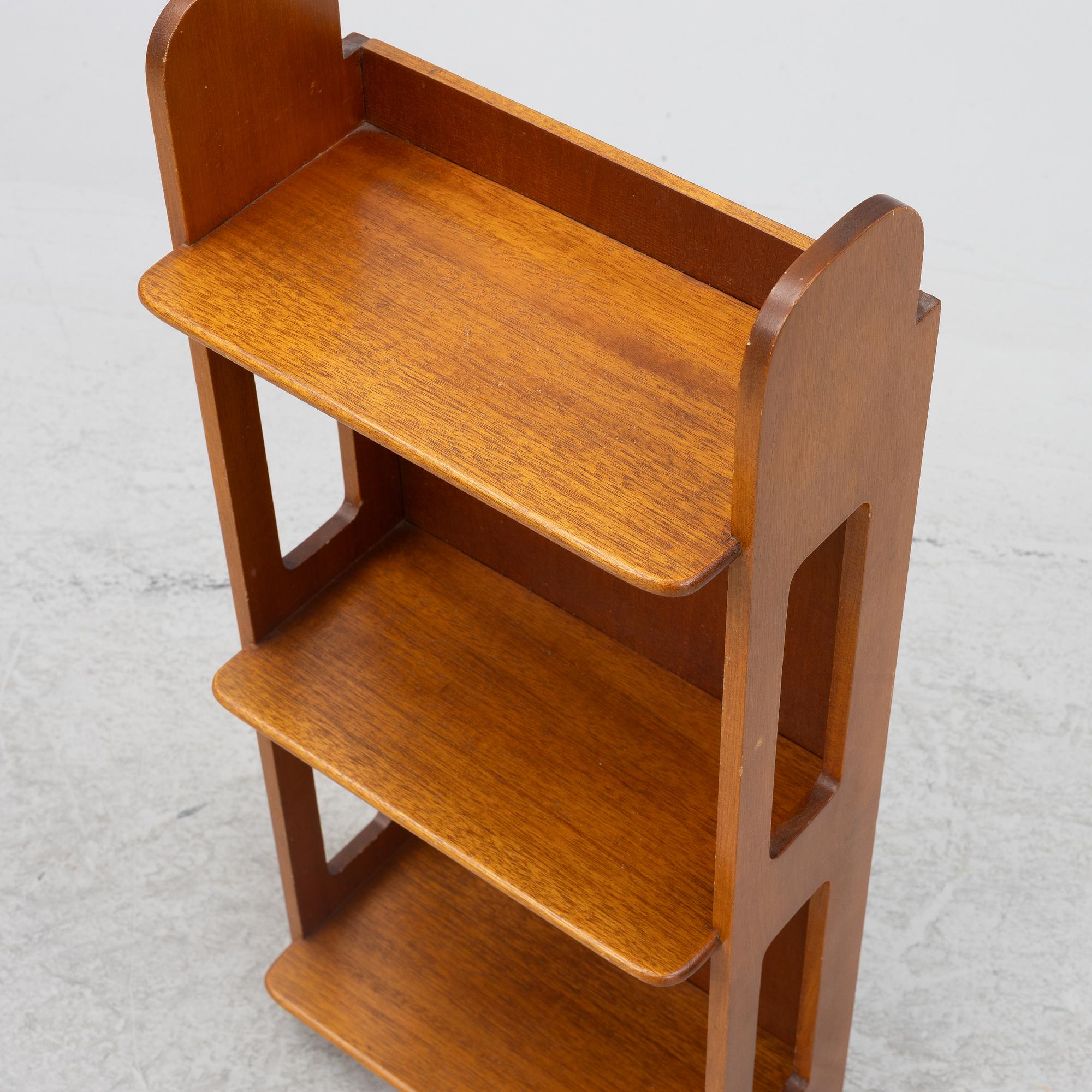 Josef Frank, a model B 2085 wall shelf for Firma Svenskt Tenn.
