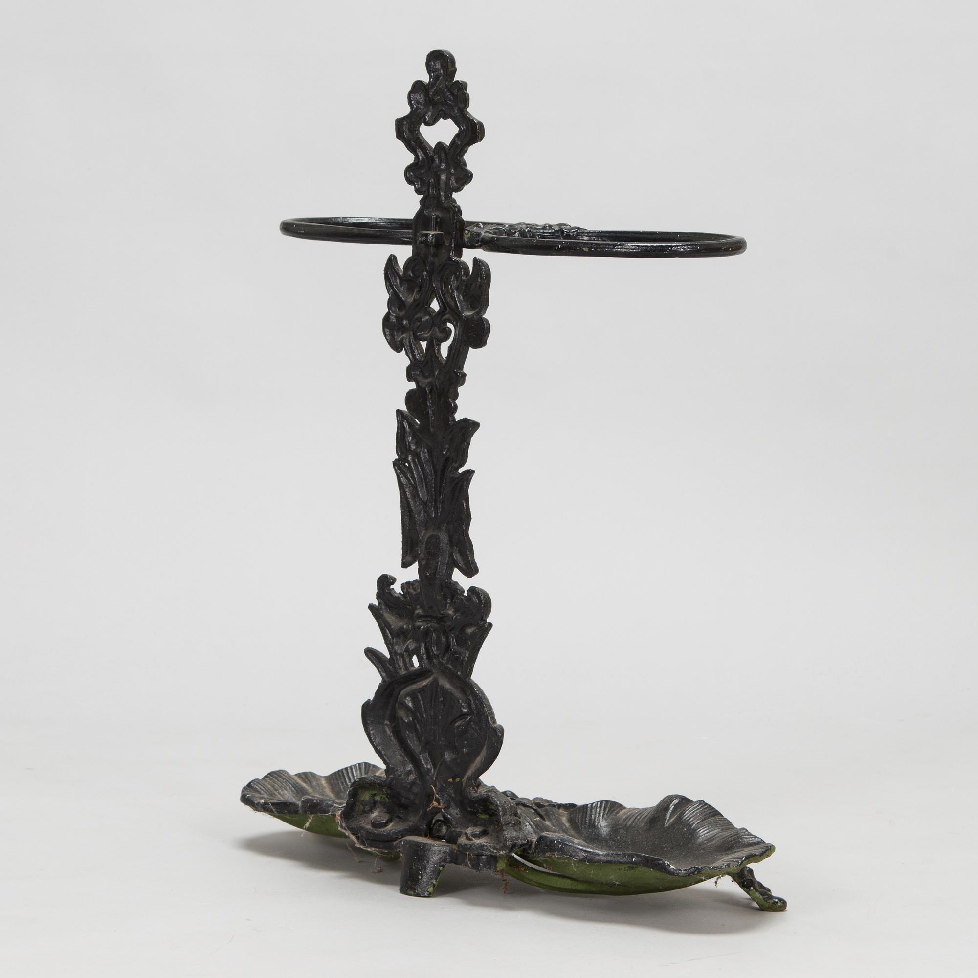 A cast iron umbrella stand, 20th Century.