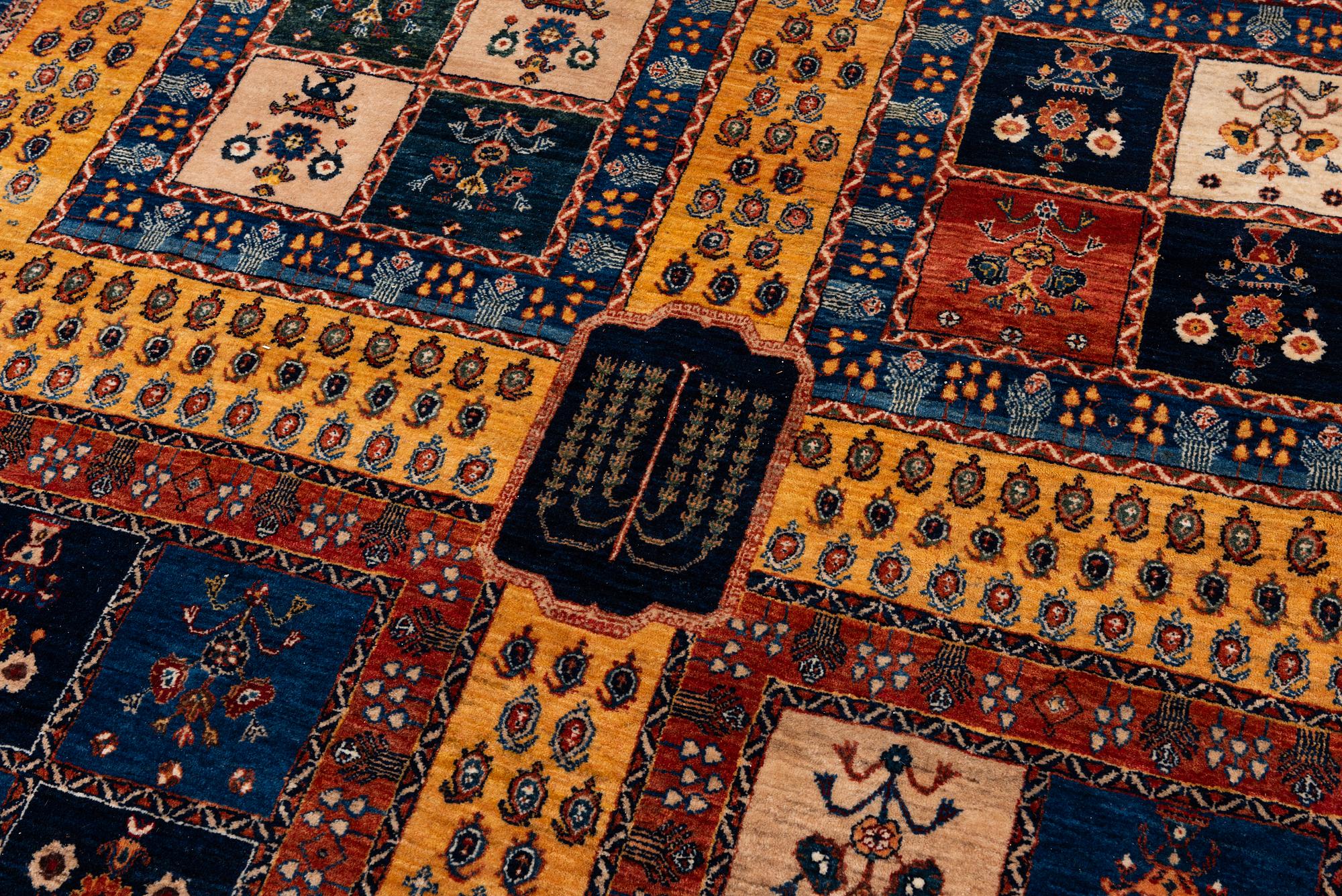 An oriental 'garden' carpet of Safavid design probably from the Shiraz area, Iran, c 343 x 254 cm.