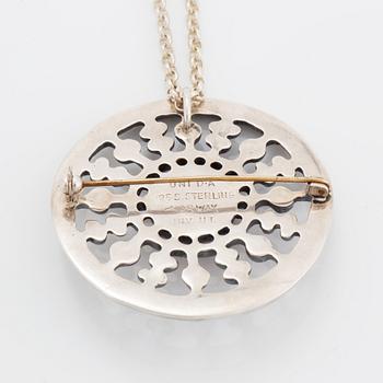 A David Andersen silver pendant.