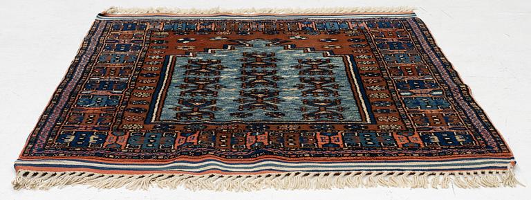 A semi-antique Anatolian rug, c. 127 x 117 cm.