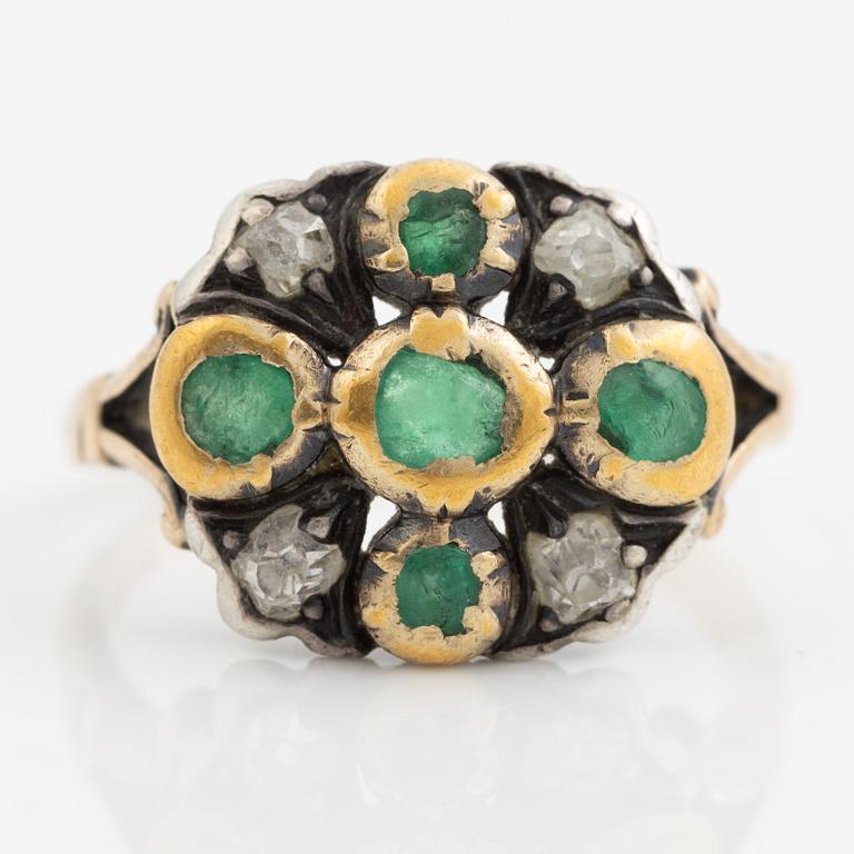 Ring 18K gold and silver set with old-cut diamonds and green stones.
