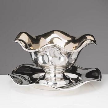 A 20th century sauce-bowl and bowl/dish, silver plated metal.