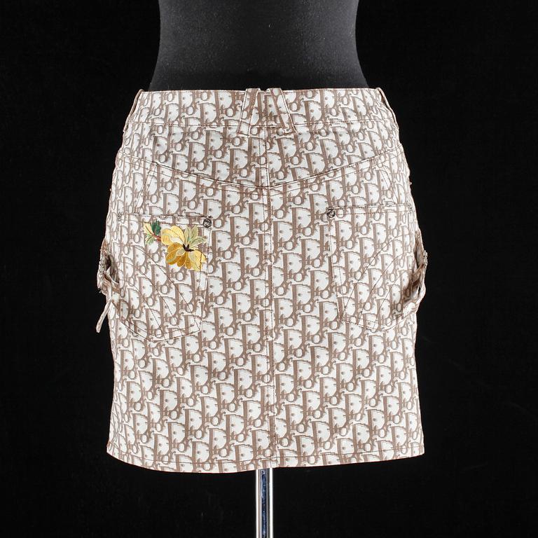 A monogram patterned skirt and plastic slip-in by Christian Dior.