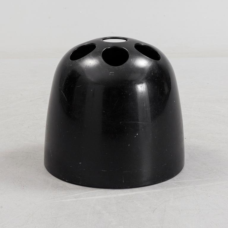 EMMA GISMONDI SCHWEINBERGER, a 'Dedalo' plastic umbrella stand from Artemide, Milan, Italy.