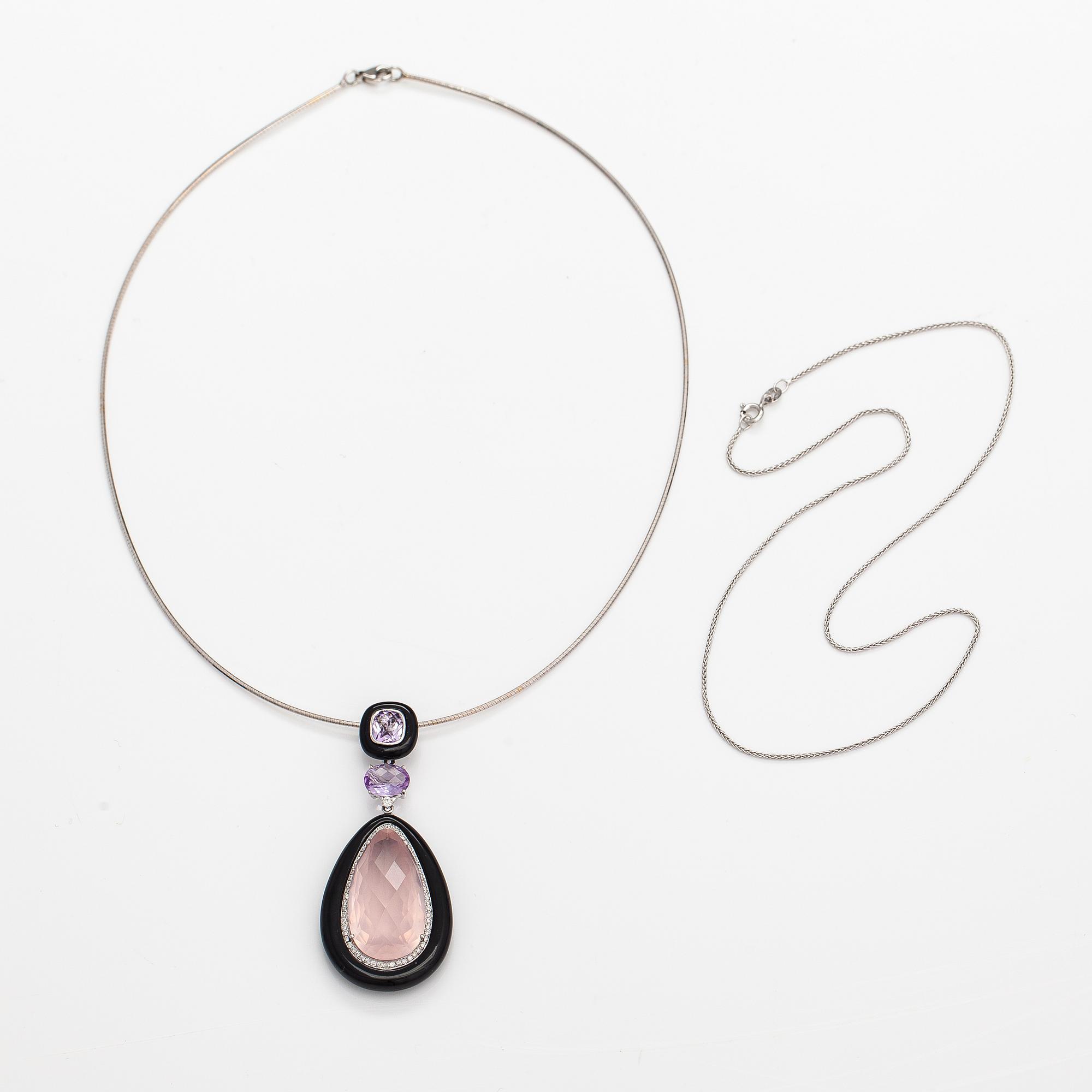 A 14K and 18k gold neackle with diamonds ca. 0.31 ct on total, onyxes, rose quartz and amethysts.