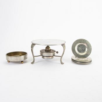 A pewter warming rack and ashtray holder Firma Svenskt Tenn 1930 and 1951.