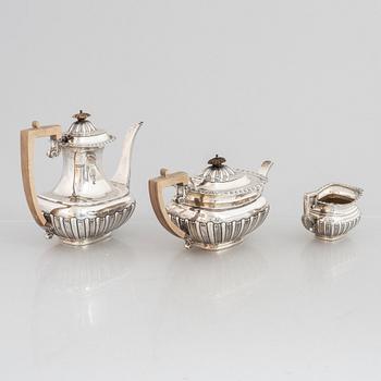 An English silver coffee pot, tea pot and cream jug, mark of Charles Boyton & Son Ltd, London 1917.