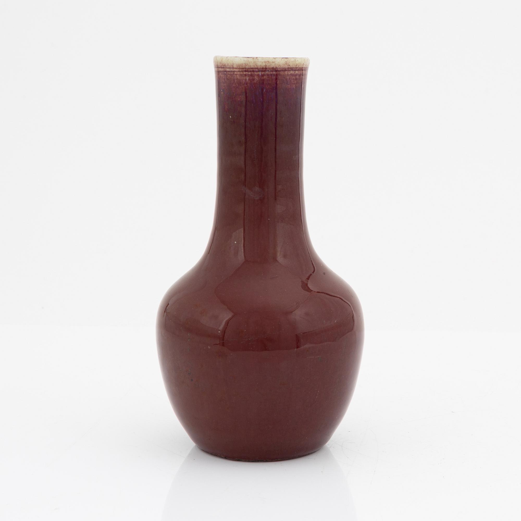 A sang de boef glazed vase, Qing dynasty, circa 1900.