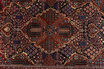 A rug, semi-antique Kashan, ca 216,5 x 140 cm.