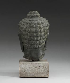 A stone head of Buddha. Thailand.