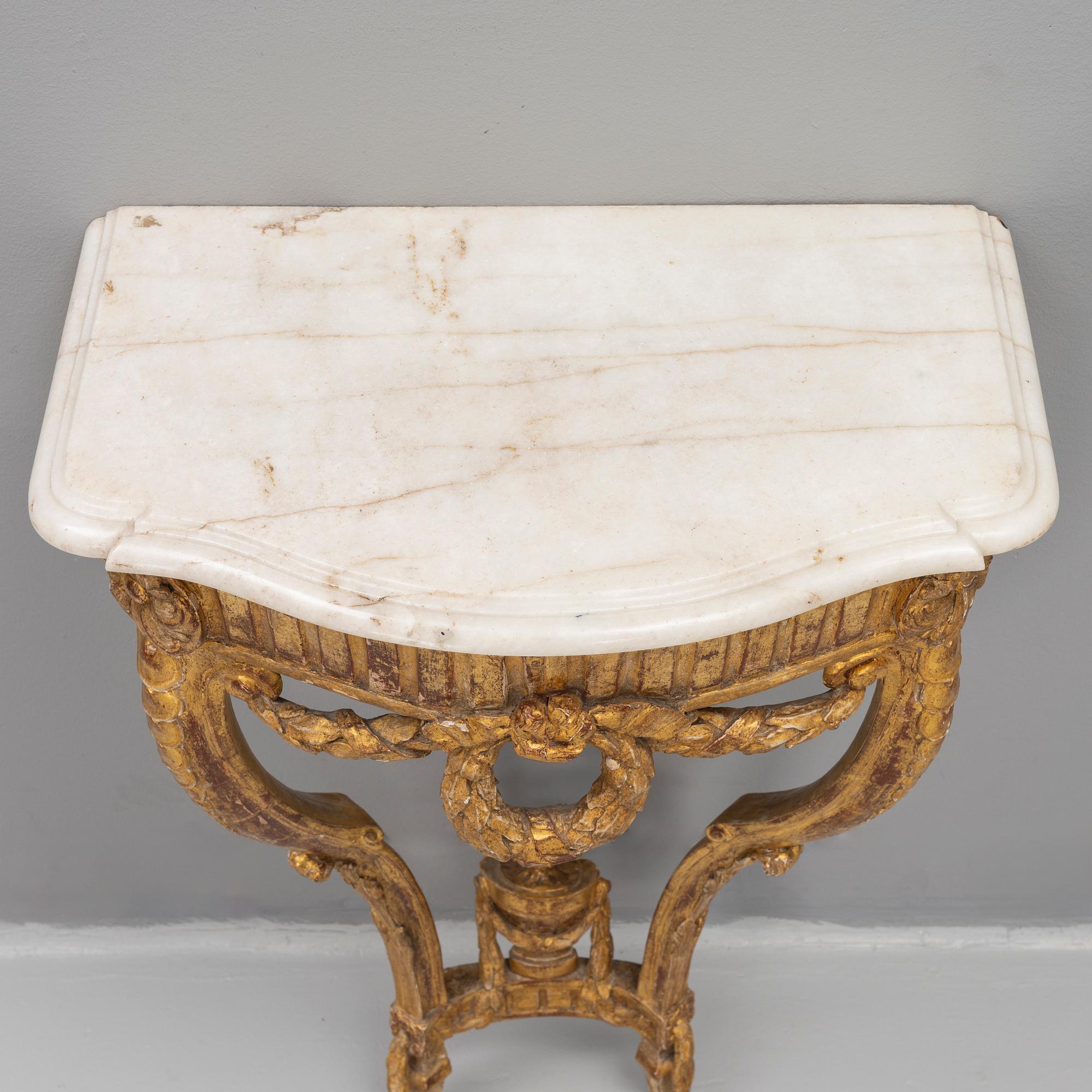 A presumably Danish Louis XVI giltwood and marble console table, late 18th century.
