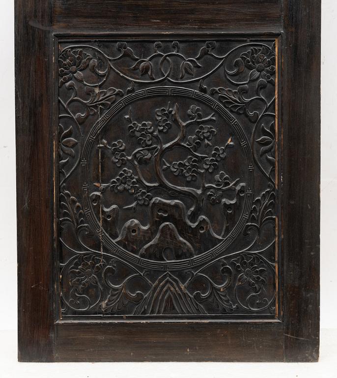 A Chinese wooden panel, Qing dynasty, 19th century.
