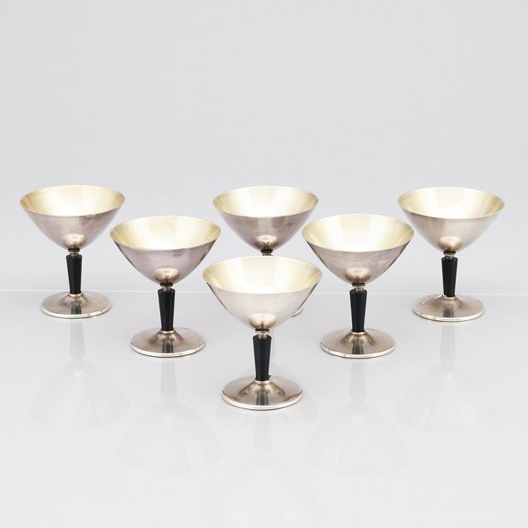 Folke Arström, an 8 pcs alpacca/ silver plated cocktail set, Guldsmedsaktiebolaget (GAB), Stockholm 1930s-50s.