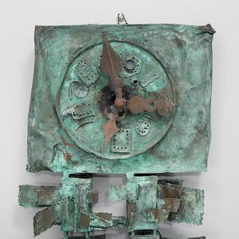 a patinated metal sculpture,