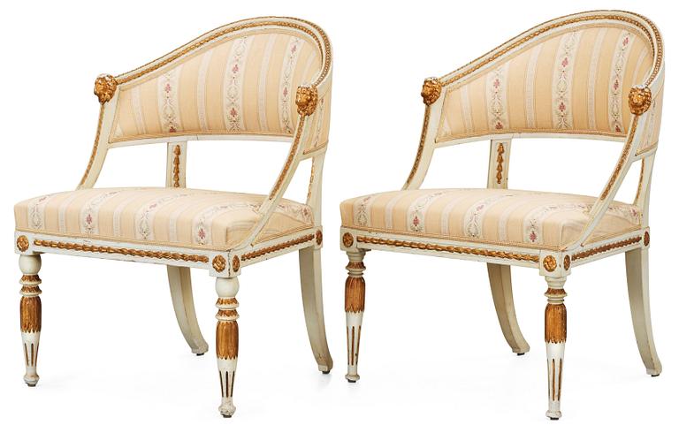 Two matched late Gustavian early 19th Century armchairs.