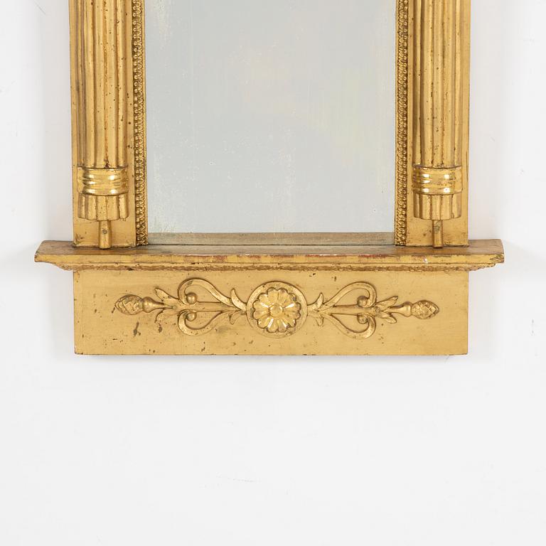 An Empire mirror, 1820.