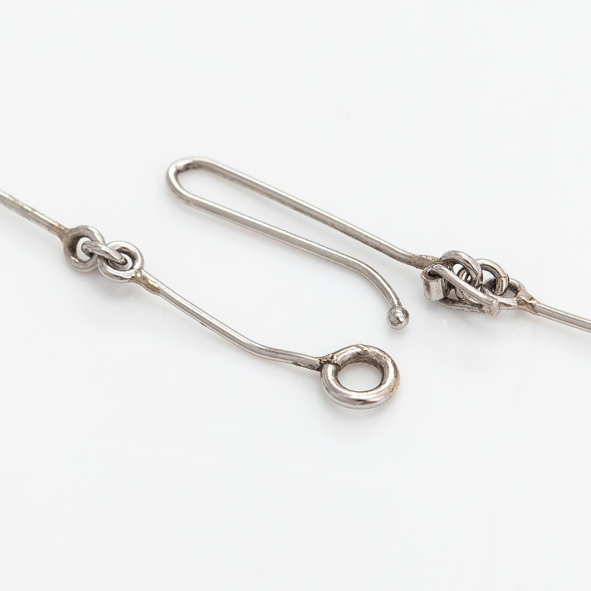Björn Weckström, A platinum necklace "Nessos" with a ca. 0.10 ct diamond. Lapponia 1981.