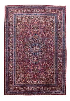 253. A carpet, antique Mashad, signed, Amoghli, ca 526,5 x 356 cm.