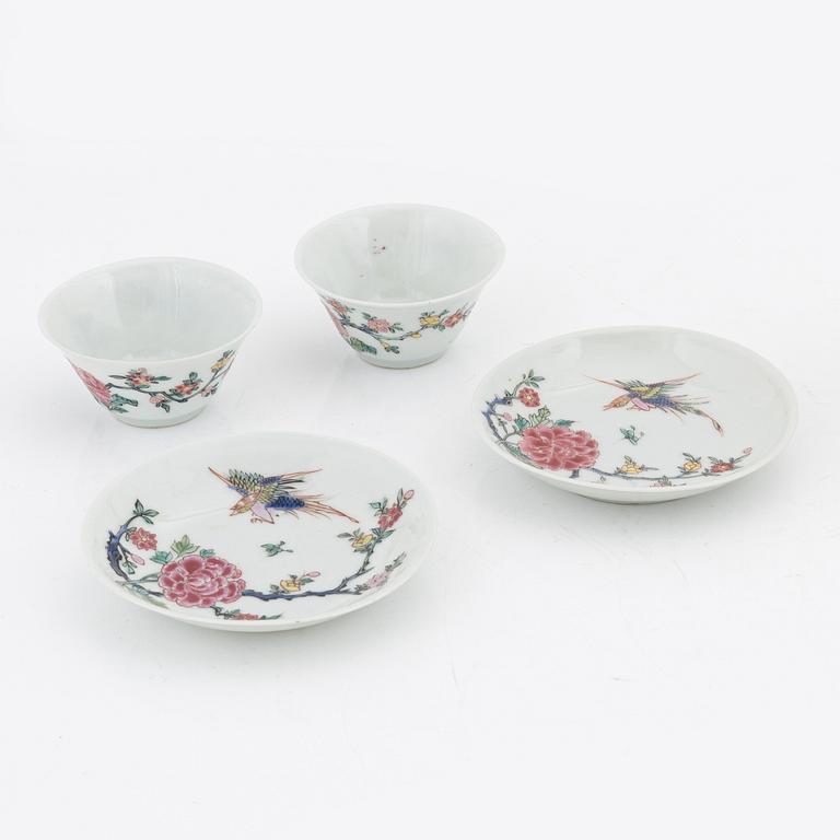 A pair of famille rose cups with stands, Qing dynasty, 18th Century.