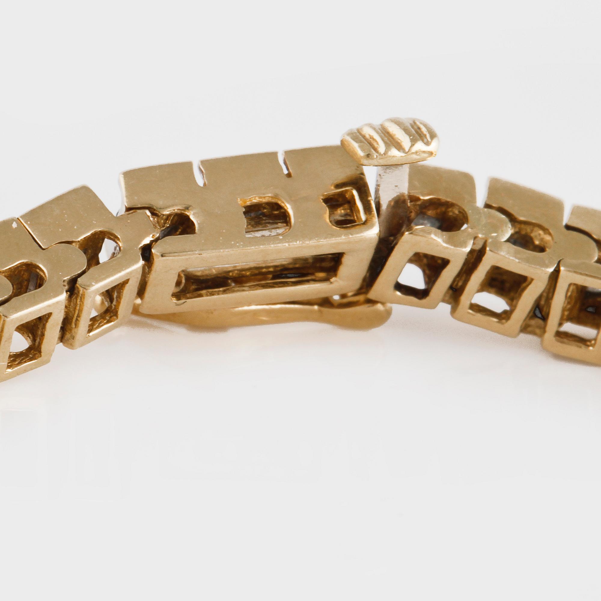 ARMLÄNK, 14K guld med briljantslipade diamanter ca 3.00 ct. Vikt 14,7 gram.